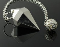 Péndulo de metal hexagonal